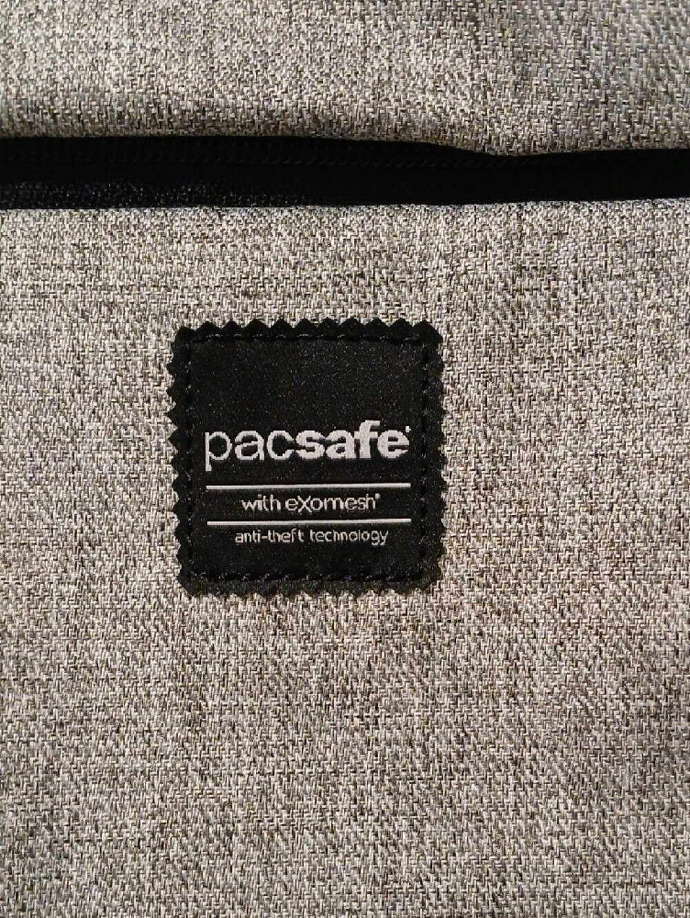 Pacsafe Heathered Gray Anti-Theft Messenger Tote with Striped Strap - Picture 2 of 11